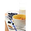 Healthy breaksfast of cereal, milk and blueberries