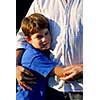 Little boy hugging his father