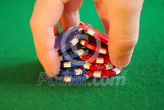 Close up on man's hand doing a pocker chip trick 'shuffle' Close up on man's hand doing a pocker chip trick 'shuffle'