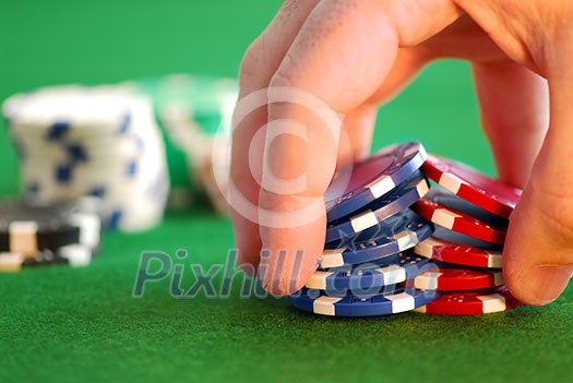 Close up on man's hand doing a pocker chip trick 'shuffle' Close up on man's hand doing a pocker chip trick 'shuffle'