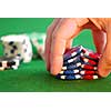Close up on man's hand doing a pocker chip trick 'shuffle'
