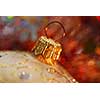 Closeup of golden christmas tree ornament glass ball