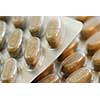 Packages of herbal supplement pills close up