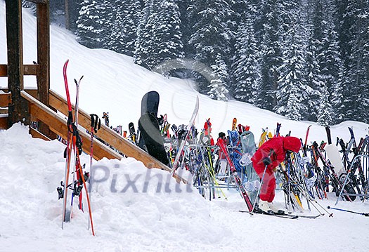 Ski rack near a chalet at downhill ski resort Ski rack near a chalet at downhill ski resort
