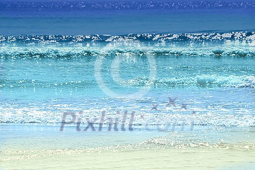 Background of colorful ocean waves sparkling in evening sun Background of colorful ocean waves sparkling in evening sun
