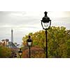 Street in Paris France with lightposts on overcast autumn day