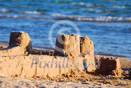 Sand castle on a beach Sand castle on a beach