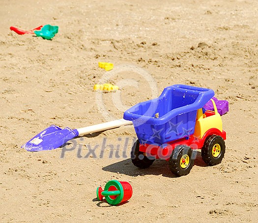 Children's sand plastic toys on a beach Children's sand plastic toys on a beach