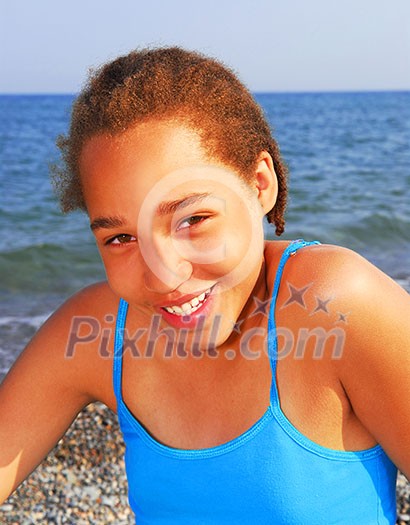 Portrait of a young beautiful girl on sea shore Portrait of a young beautiful girl on sea shore