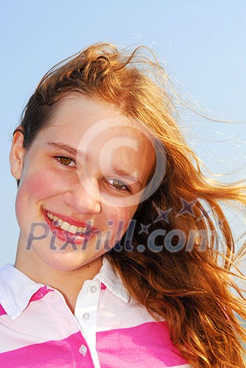 Portrait of a beautiful young girl on a breezy day outside Portrait of a beautiful young girl on a breezy day outside