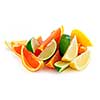 Wedges of assorted citrus fruits isolated on white background