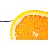 Orange slice in water on white background