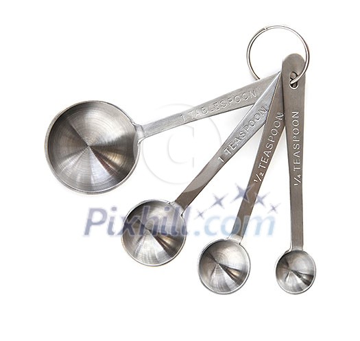 Metal measuring spoons isolated on white background Metal measuring spoons isolated on white background