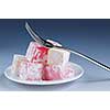 Turkish delight (lokum) confection on a white dessert plate