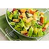 Fresh caesar salad served in a glass bowl