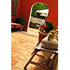 Courtyard of mediterranean villa in French Riviera. Shallow depths of filed, focus on amphoras.