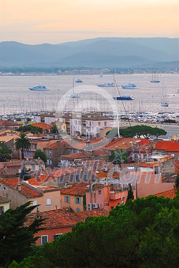 View on St. Tropez harbor in French Riviera at sunset View on St. Tropez harbor in French Riviera at sunset