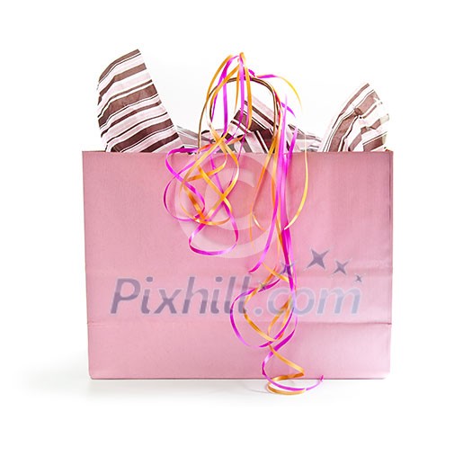 Pink shopping bag with ribbons isolated on white background Pink shopping bag with ribbons isolated on white background