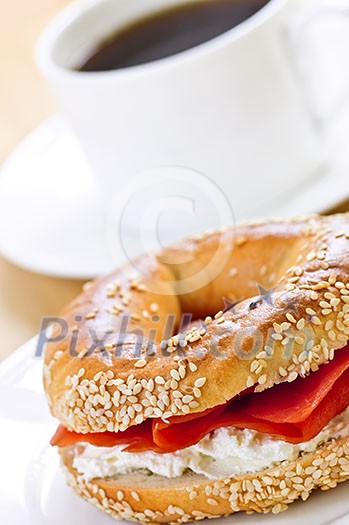 Light meal of smoked salmon bagel and coffee Light meal of smoked salmon bagel and coffee