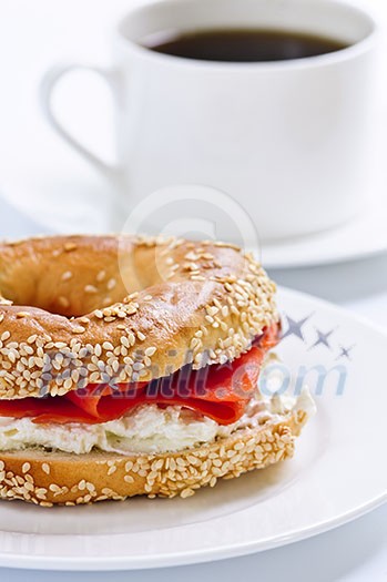 Light meal of smoked salmon bagel and coffee Light meal of smoked salmon bagel and coffee