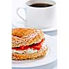 Light meal of smoked salmon bagel and coffee