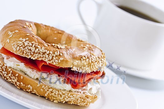 Light meal of smoked salmon bagel and coffee Light meal of smoked salmon bagel and coffee