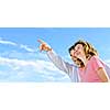 Mature romantic couple of baby boomers looking at the sky