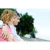Portrait of mature romantic couple on a bench
