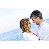 Portrait of mature romantic couple at seashore