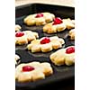 Fresh shortbread cookies on a baking tray