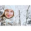 Teenage girl in winter hat with cup of hot chocolate