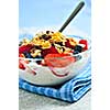 Serving of yogurt with fresh berries and granola