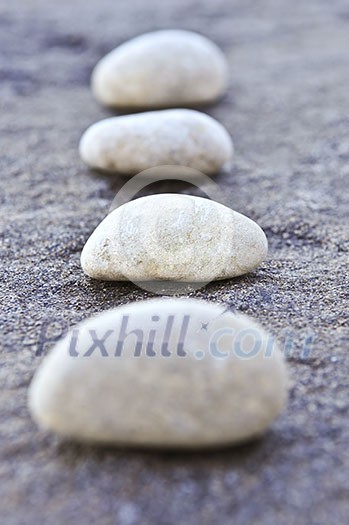 Small stones on a surface of big rock Small stones on a surface of big rock