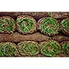 Stack of rolled grass sod or turf for lawns and landscaping