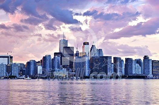 Scenic view at Toronto city waterfront skyline at sunset Scenic view at Toronto city waterfront skyline at sunset
