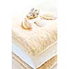 Stack of soft towels isolated on white background