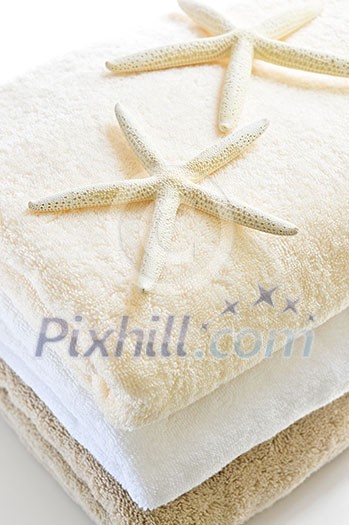 Stack of soft towels isolated on white background Stack of soft towels isolated on white background