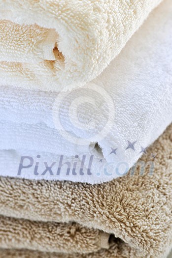 Background of soft stacked towels close up Background of soft stacked towels close up