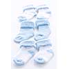 Arrangement of three pairs of blue infant boy socks for baby shower