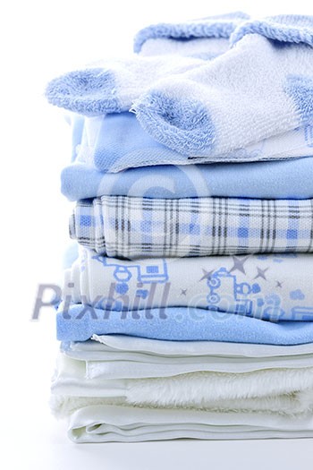 Stack of blue infant clothing for baby shower Stack of blue infant clothing for baby shower