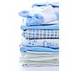 Stack of blue infant clothing for baby shower