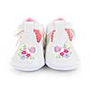 Closeup of girl baby shoes isolated on white background