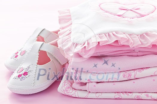 Pink infant girl clothing and shoes for baby shower