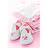 Pink infant girl clothing and shoes for baby shower