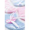 Pink and blue infant socks for baby shower with ribbon