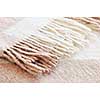 Soft and warm folded alpaca wool blanket with fringe