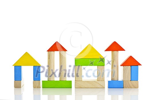Buildings constructed out of toy wooden building blocks Buildings constructed out of toy wooden building blocks