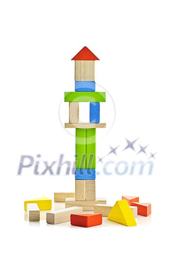 Tower of wooden building block toys isolated on white background Tower of wooden building block toys isolated on white background