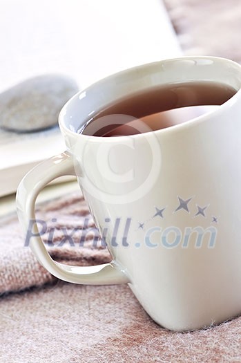 Relaxing with a book and cup of tea Relaxing with a book and cup of tea