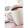 Relaxing with a book and cup of tea